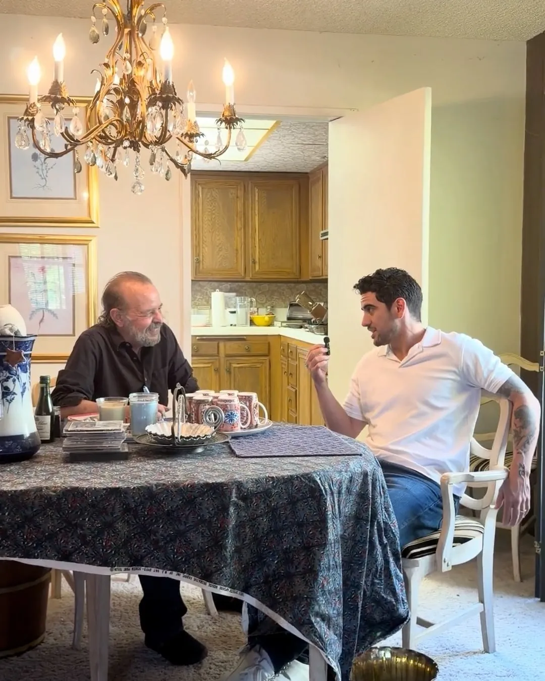 Lee and Jose at the dining table, the day after closing